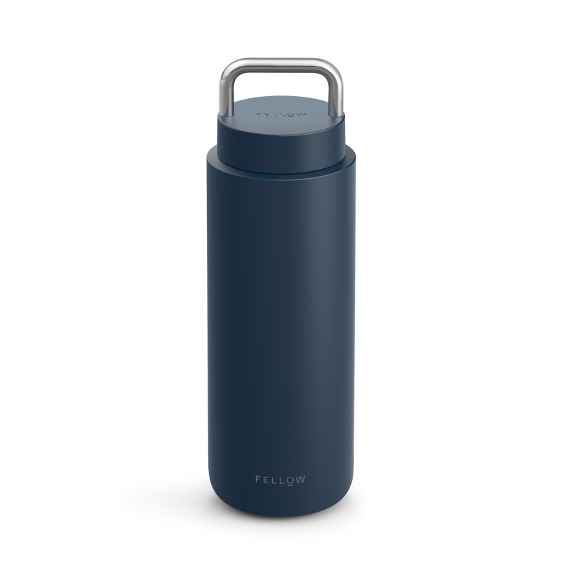 Fellows Carter Carry is a dark blue insulated bottle with a metal handle on top.