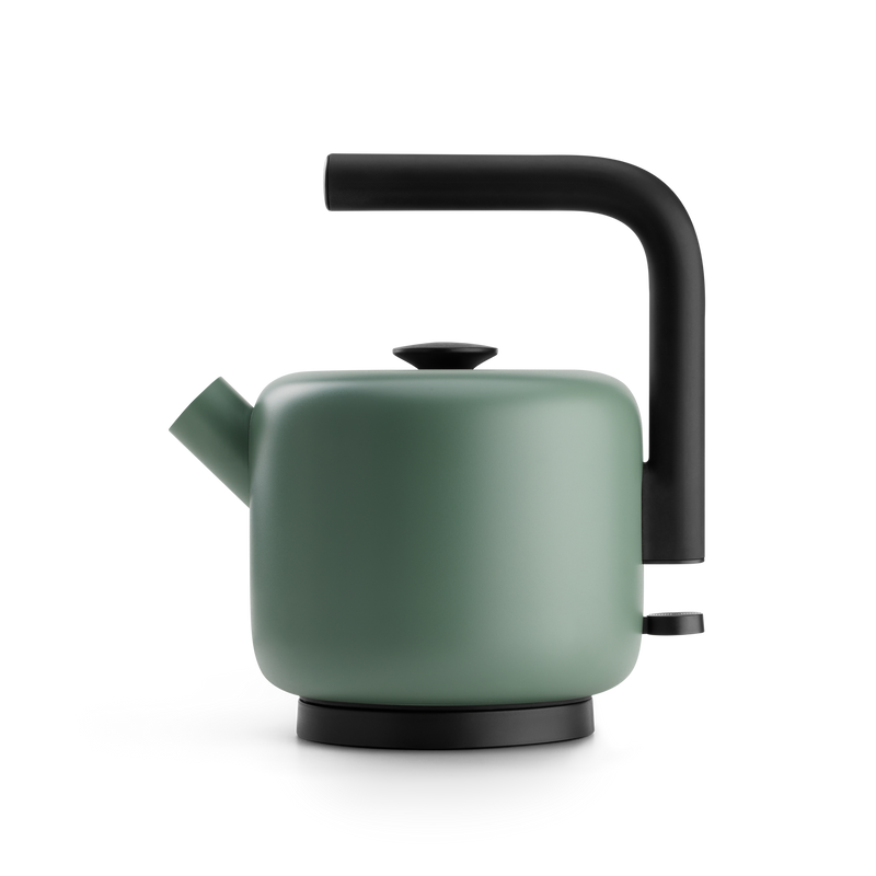 Clyde Electric Kettle, a modern green Fellow teapot with black handle on black background.