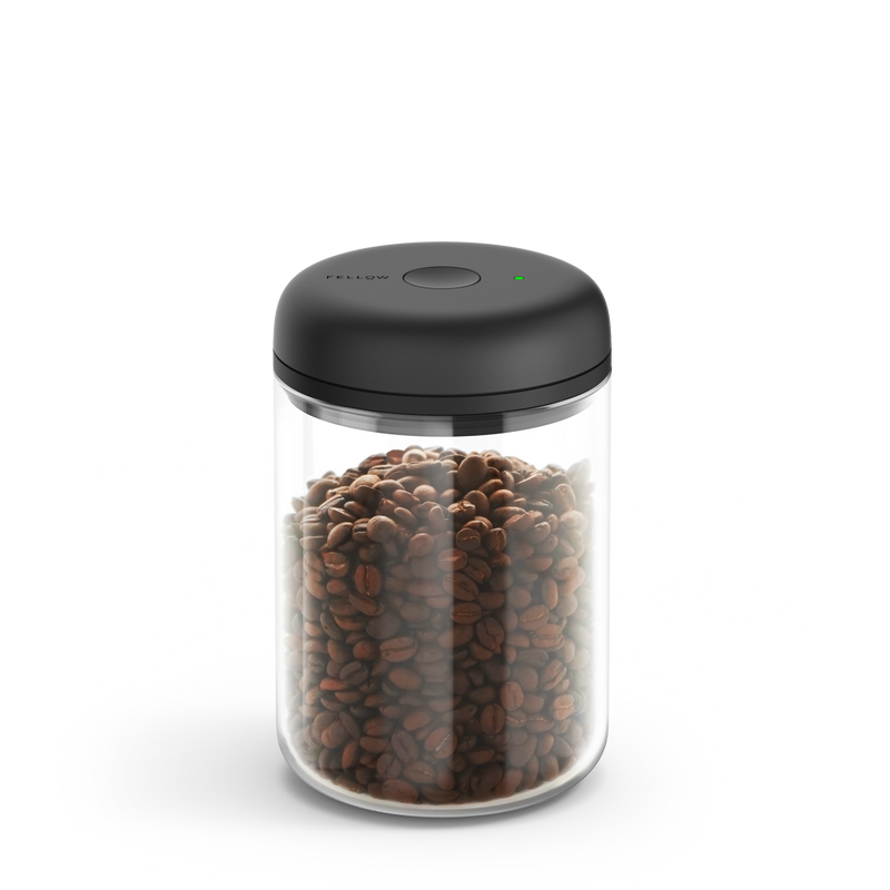 The Fellow Atmos Vacuum Canister includes vacuum-sealed storage and a black lid.
